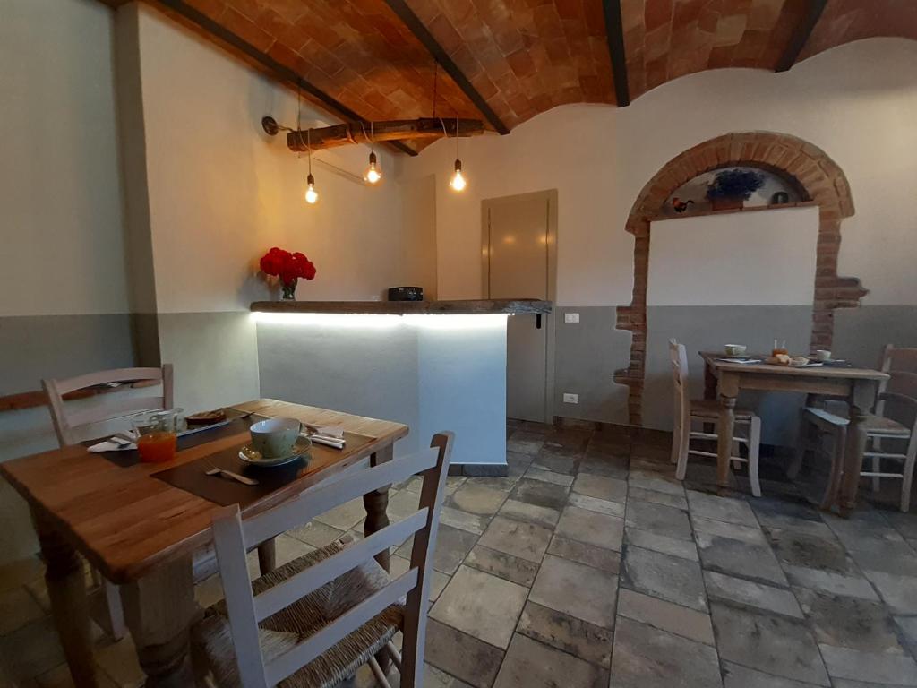 Reštaurácia alebo iné gastronomické zariadenie v ubytovaní Agriturismo Poggio Ridulfo