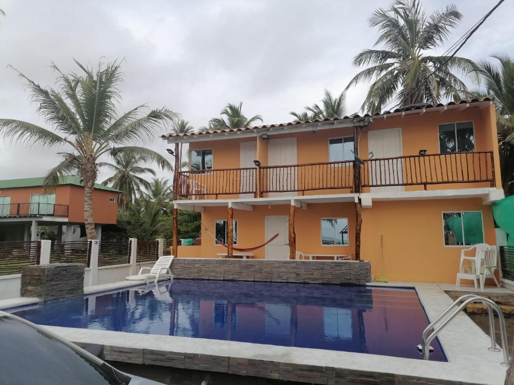 Cabaña frente al mar en moñitos córdoba - Casa De Cuatro Dormitorios