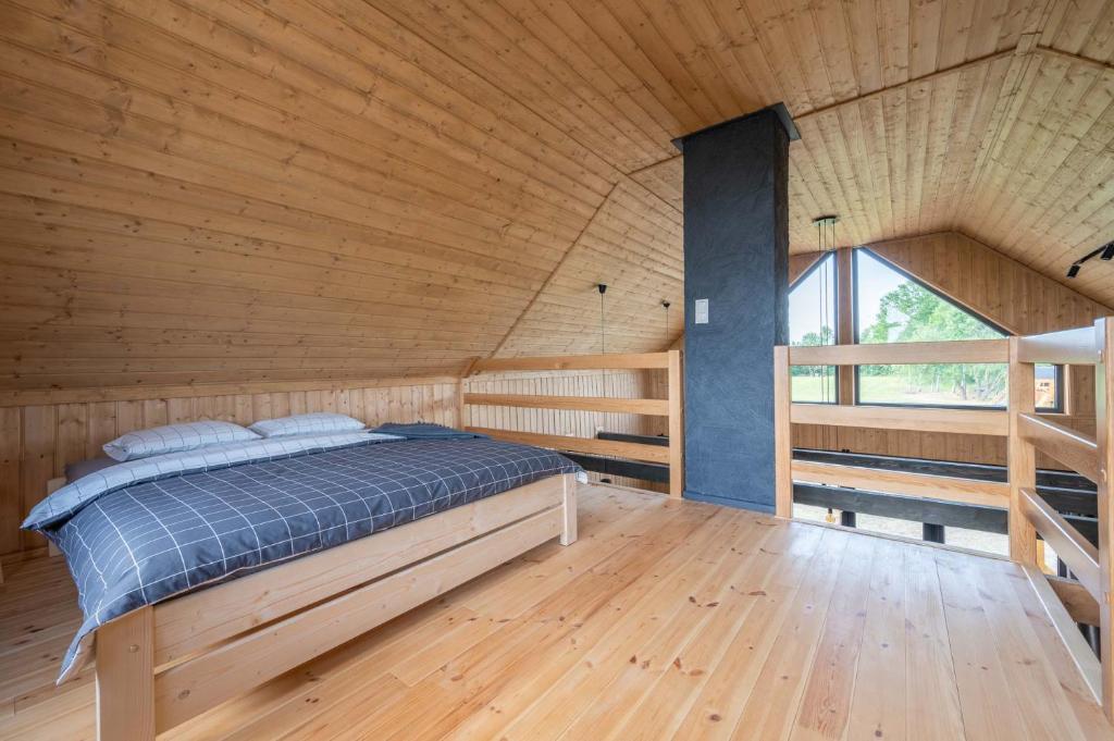 Postel nebo postele na pokoji v ubytování Siedlisko Rusko