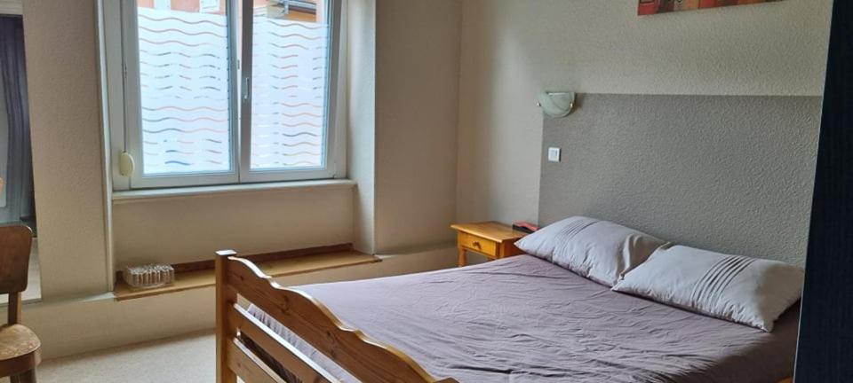 Postel nebo postele na pokoji v ubytování Résidence SoAnSa du Gérardmer - Col de la Schlucht