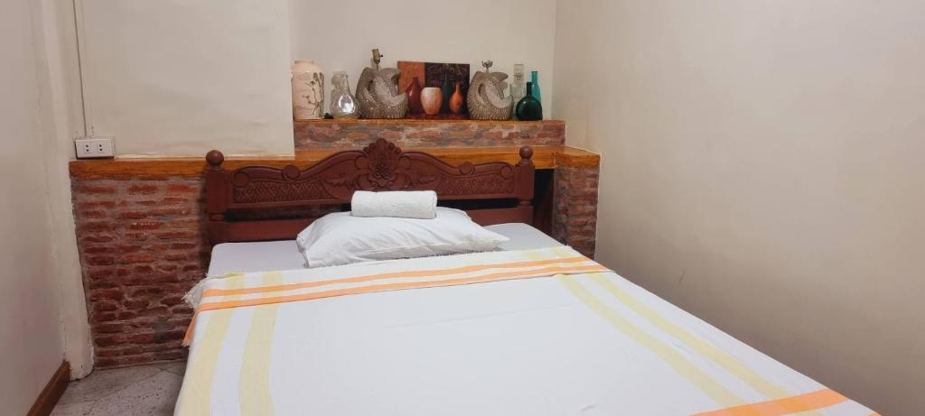 Postel nebo postele na pokoji v ubytování Casa Familya