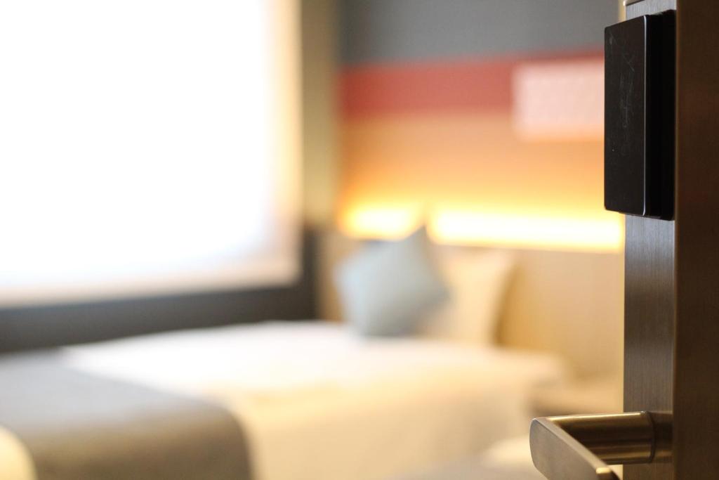 KOKO HOTEL Tsukiji Ginzaにあるベッド