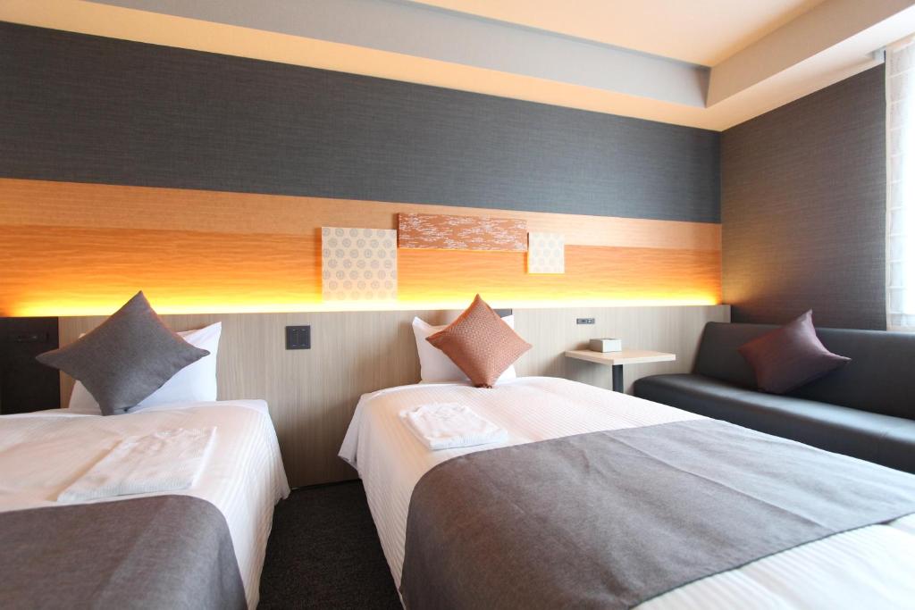 KOKO HOTEL Tsukiji Ginzaにあるベッド