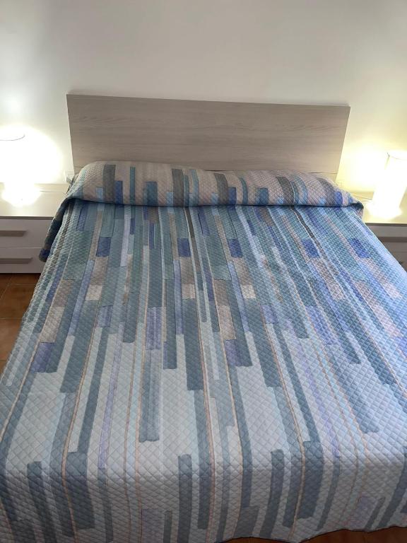 Postel nebo postele na pokoji v ubytování Nel Cuore di Campomarino
