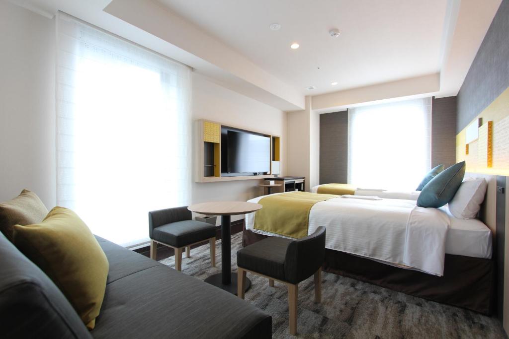 KOKO HOTEL Tsukiji Ginzaにあるテレビまたはエンターテインメントセンター
