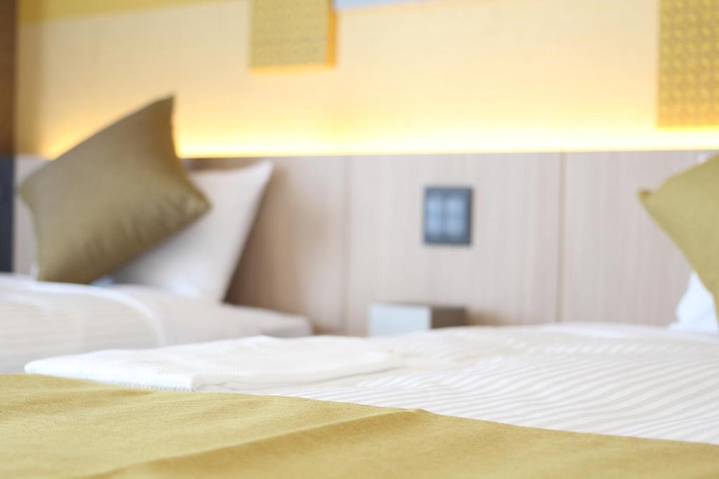 KOKO HOTEL Tsukiji Ginzaにあるベッド