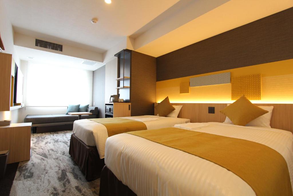 KOKO HOTEL Tsukiji Ginzaにあるベッド