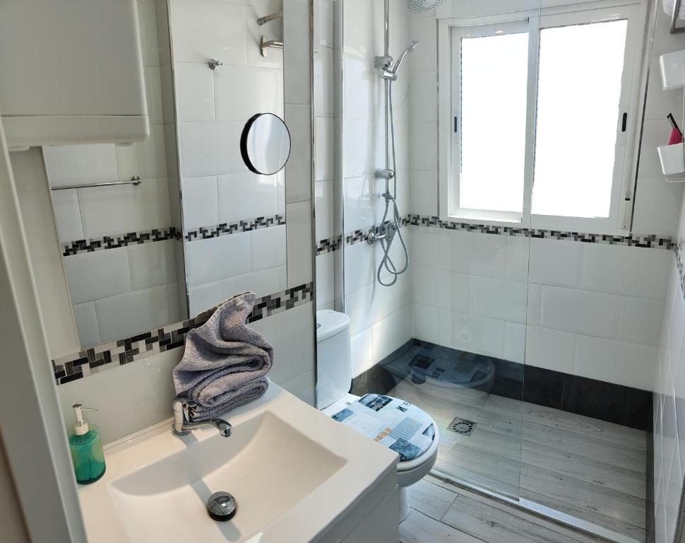 Łazienka w obiekcie Solaz-Andaluz City Center Apartment BY NAMASTE ELITE
