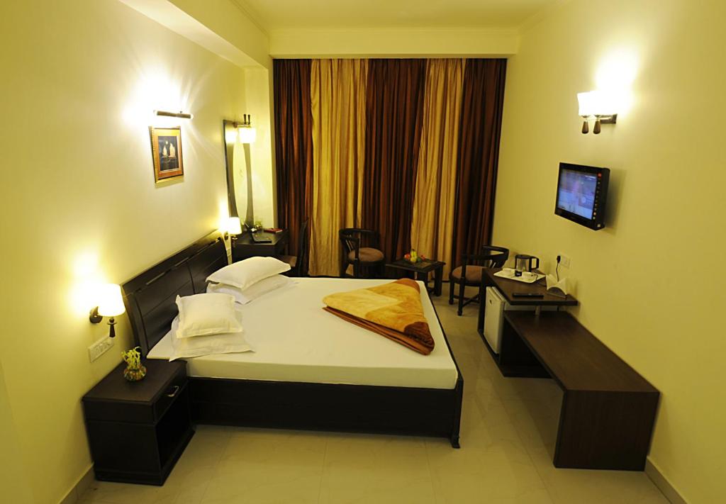 TV a/nebo společenská místnost v ubytování Hotel Hong Kong Inn