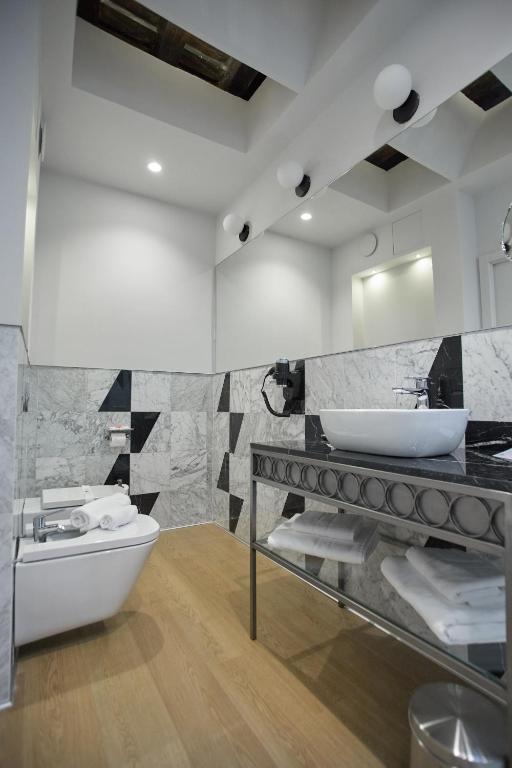 Postel nebo postele na pokoji v ubytování Hotel Boutique Posada de Sillería