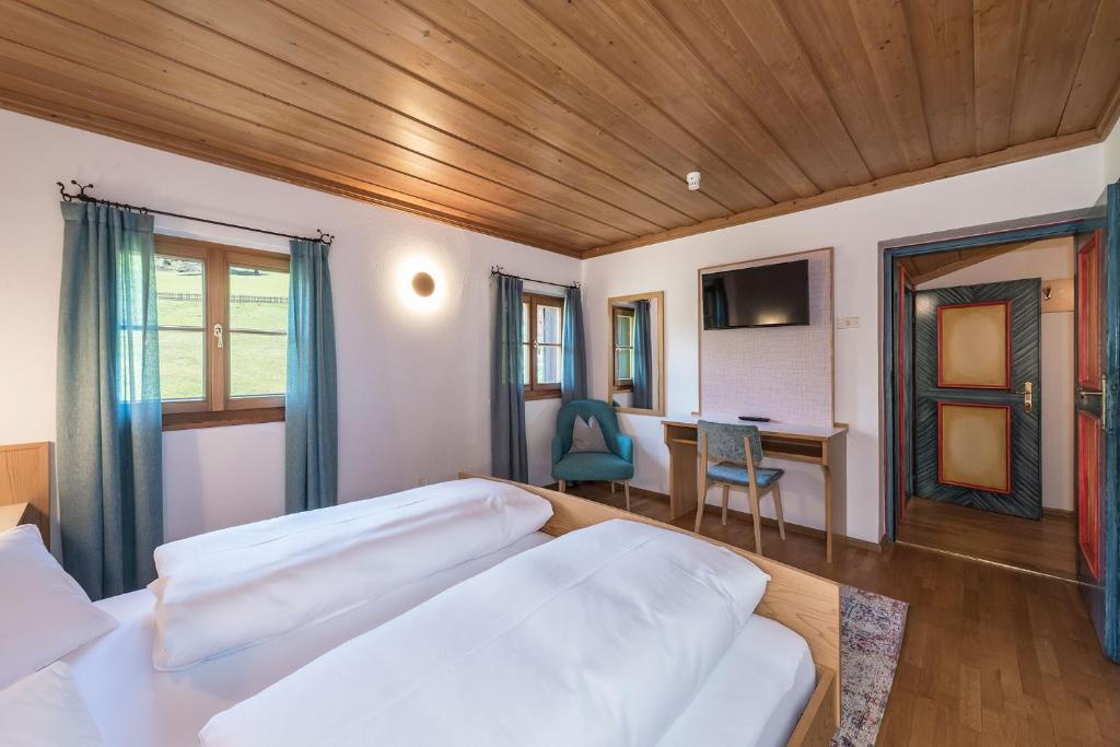 Postel nebo postele na pokoji v ubytování Hotel Bewaller