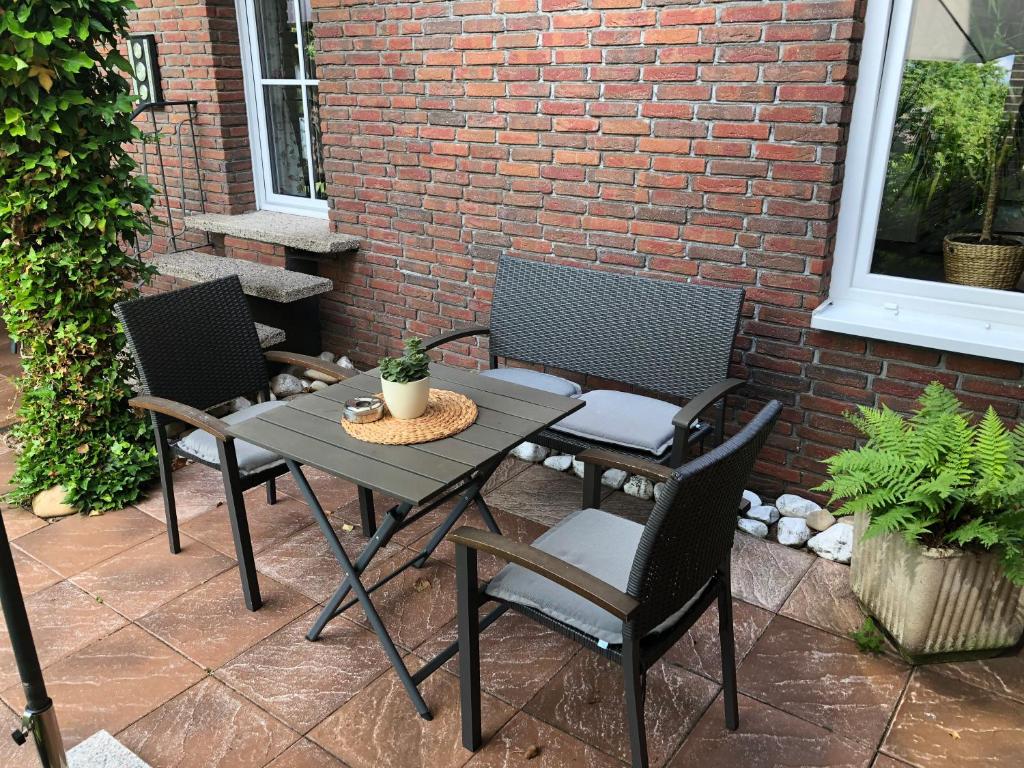 a table and chairs sitting on a patio at Mansion in Bad Arolsen