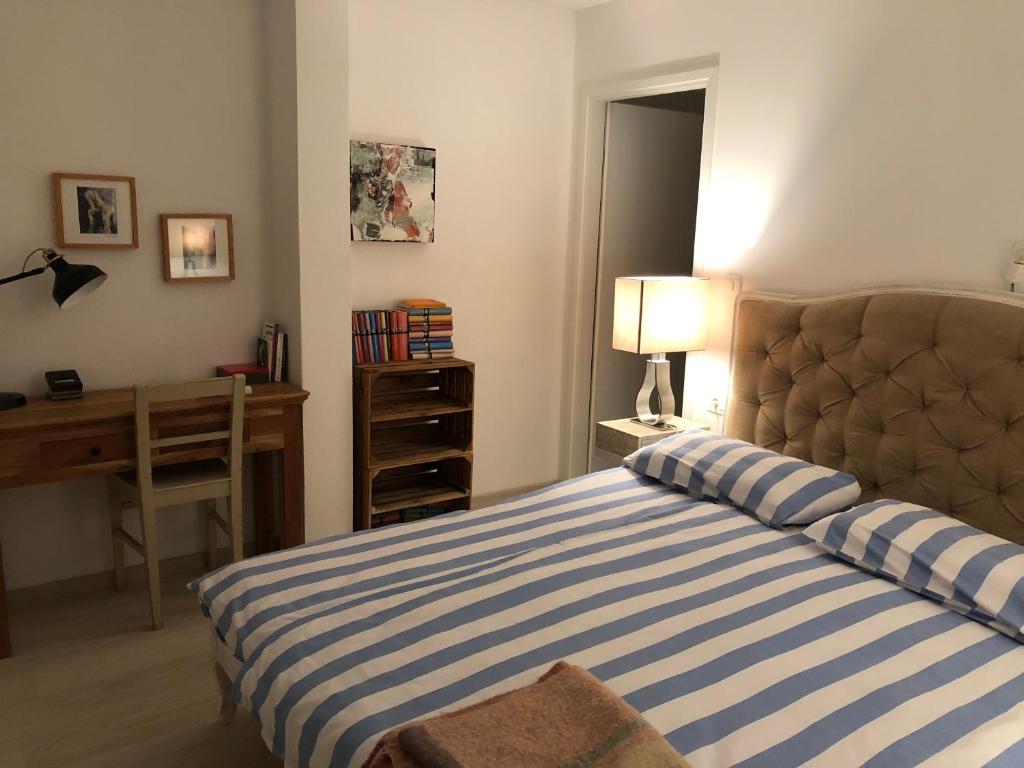 Postel nebo postele na pokoji v ubytování VILLA IL BLU direkt am Meer