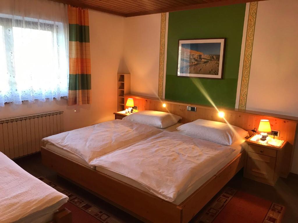 Posteľ alebo postele v izbe v ubytovaní Haus Fernsebner
