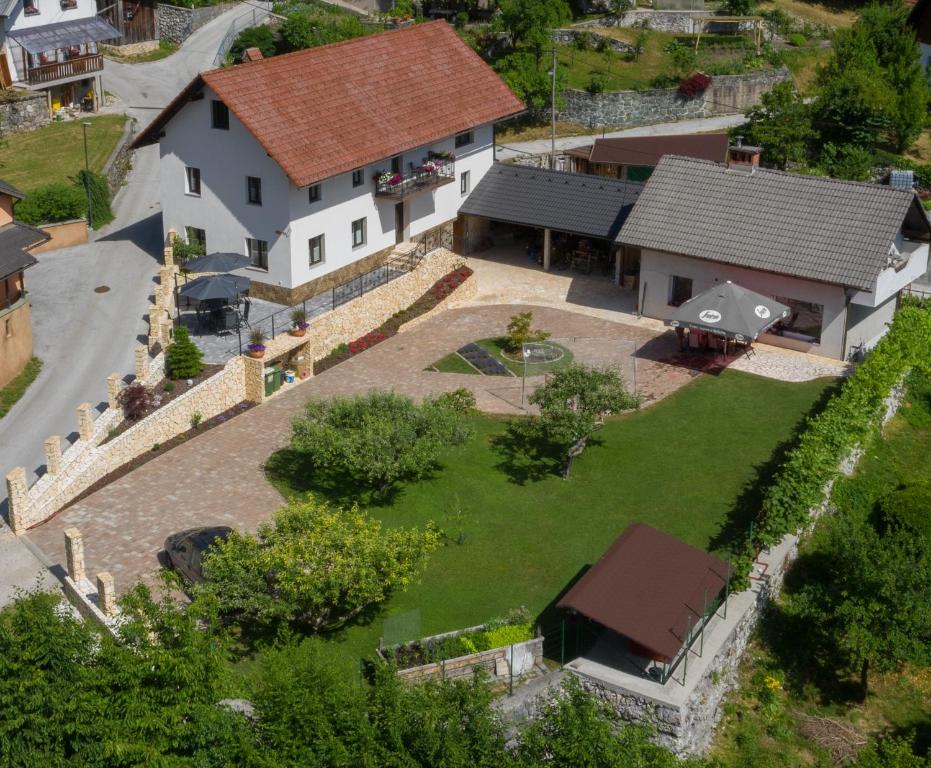 an aerial view of a house with a yard at Apartmaji Pr'Pišk in Bohinjska Bela