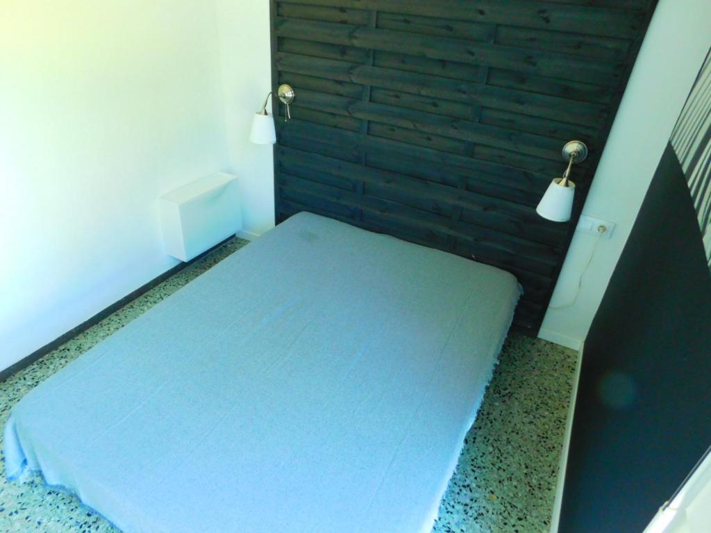 Posteľ alebo postele v izbe v ubytovaní GMID IMMO Apartamento apartsol