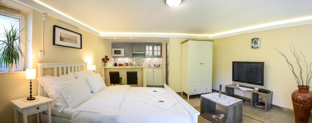 Postel nebo postele na pokoji v ubytování Terrace Apartments