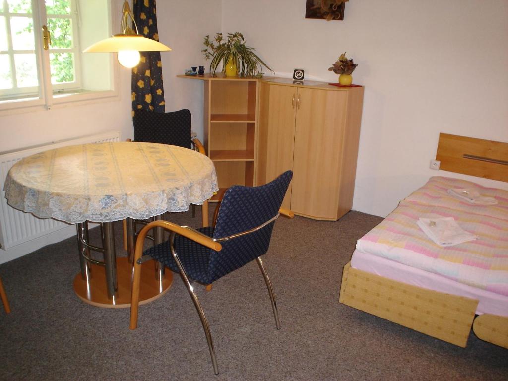 Postel nebo postele na pokoji v ubytování Ubytování v Českém ráji