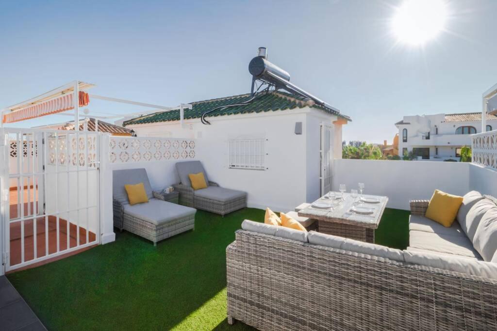 A seating area at Apartment with pool TORREVISTA ROCIO
