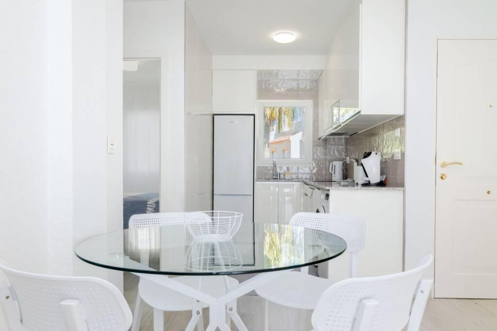 A kitchen or kitchenette at Apartment with pool TORREVISTA ROCIO