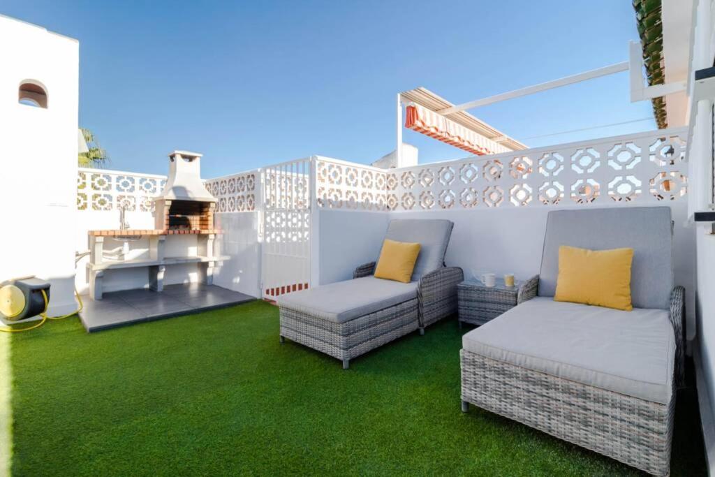 A seating area at Apartment with pool TORREVISTA ROCIO