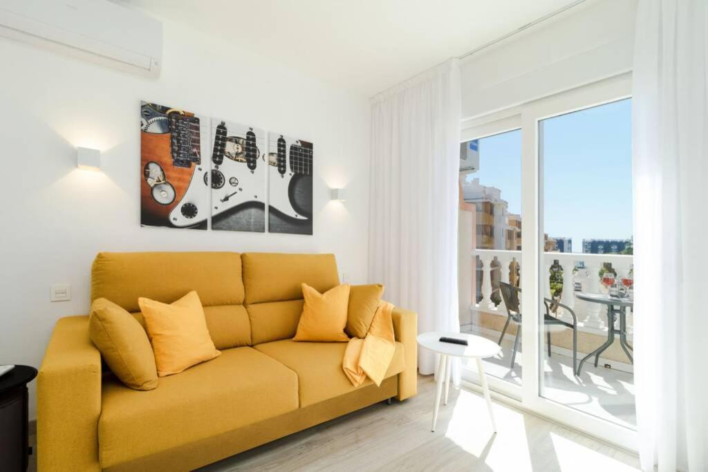 A seating area at Apartment with pool TORREVISTA ROCIO