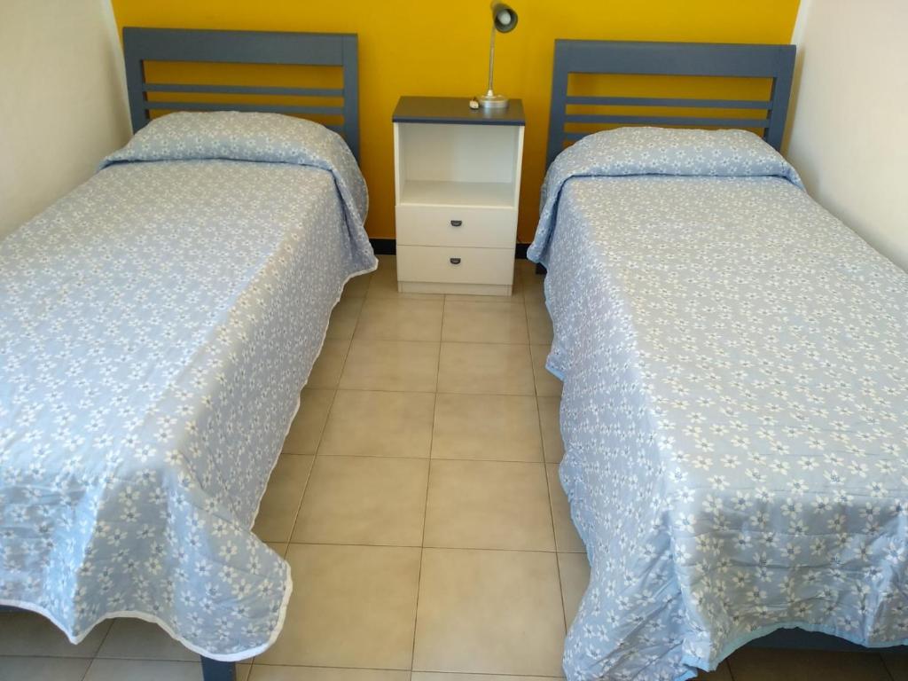 Posteľ alebo postele v izbe v ubytovaní Casa Lucia