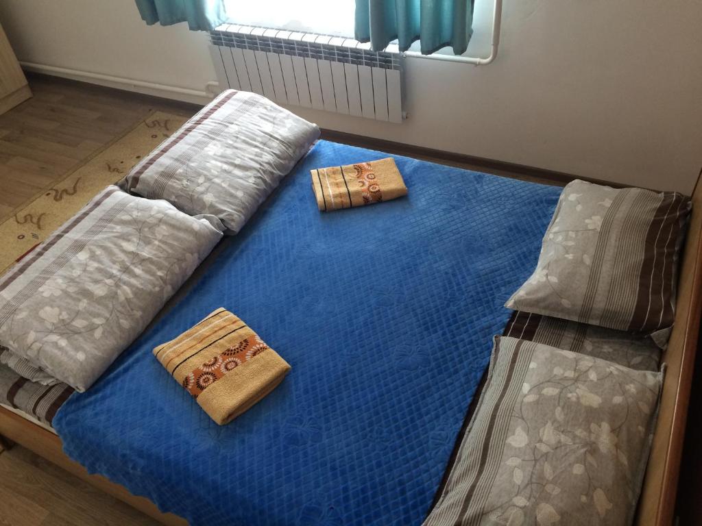 Postel nebo postele na pokoji v ubytování KbH-Karakol based Hostel