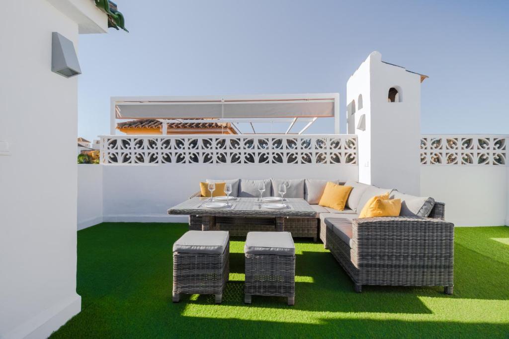 A seating area at Apartment with pool TORREVISTA ROCIO