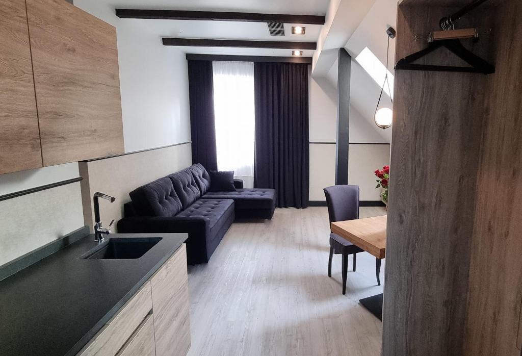 Posedenie v ubytovaní RATUSZOVA Stary Rynek Old Market SQ PREMIUM Apartments & Restaurant AD 1954