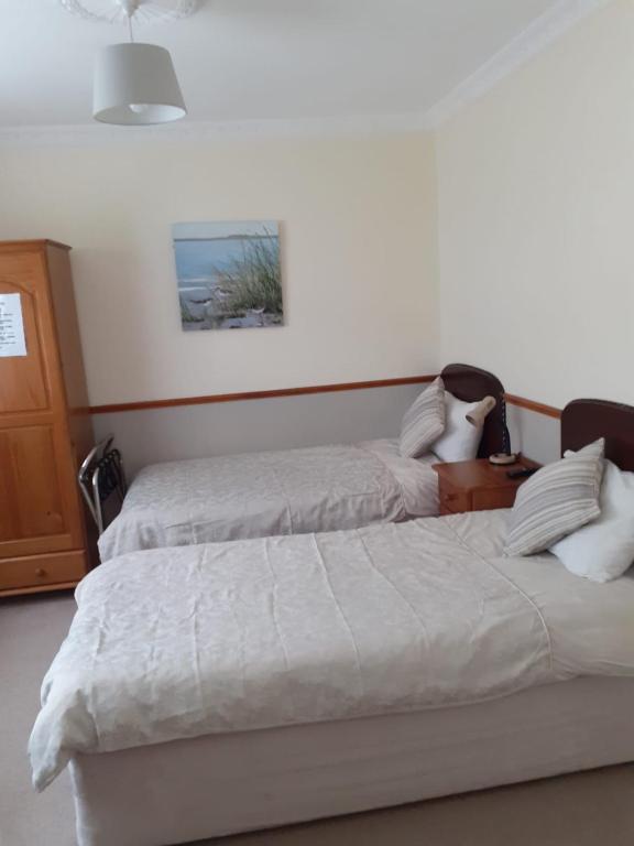 Postel nebo postele na pokoji v ubytování Breagagh View B&B