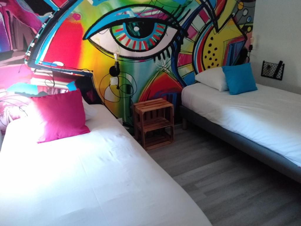 Postel nebo postele na pokoji v ubytování Urban Style Arl HOTEL