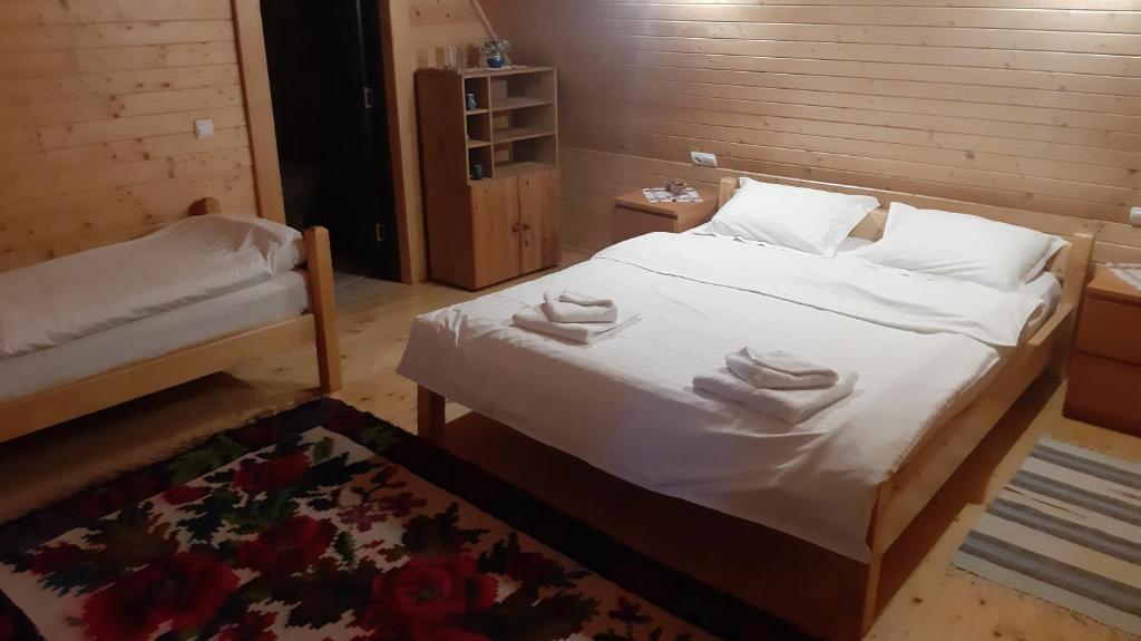 Postel nebo postele na pokoji v ubytování Casa Buga