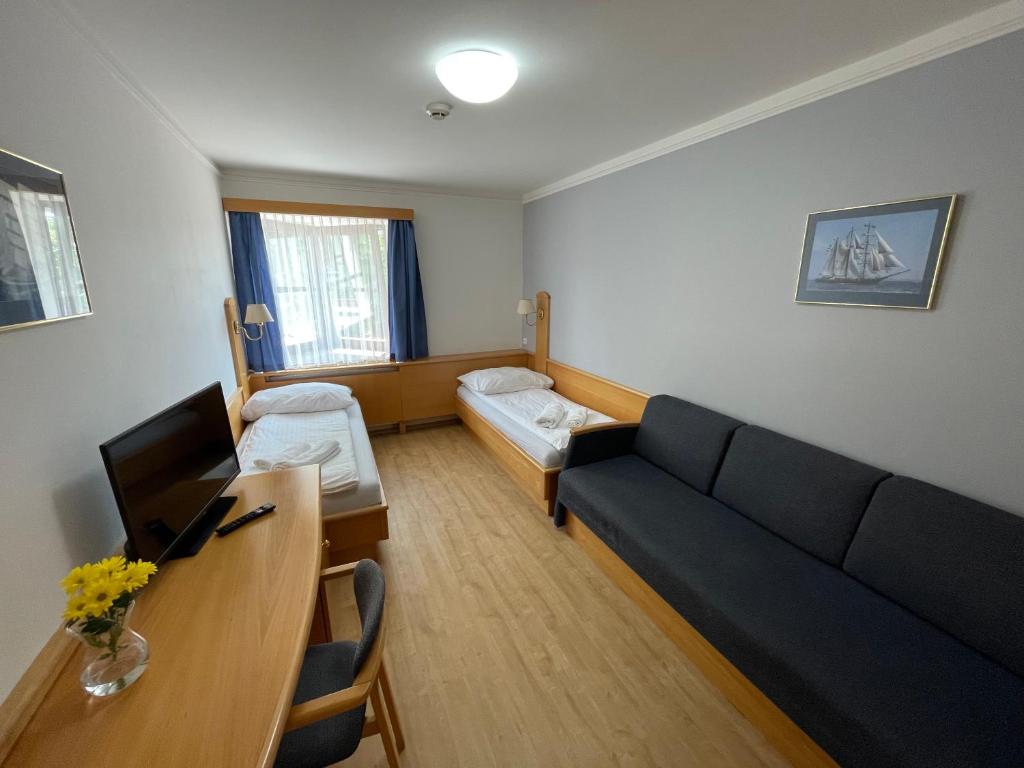 TV a/nebo společenská místnost v ubytování Hotel Laguna & restaurant