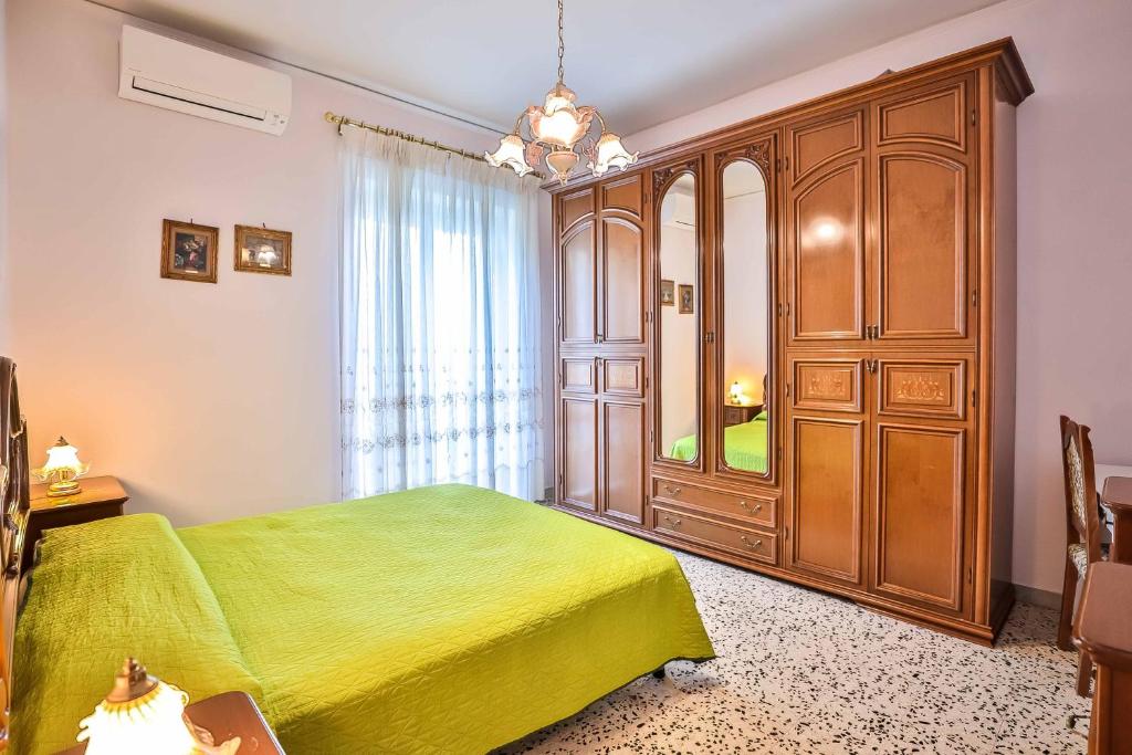 A bed or beds in a room at Apartment with 4 bedrooms in Amalfi