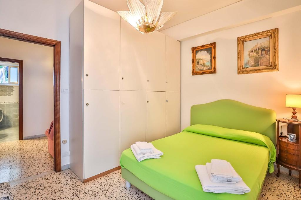 A bed or beds in a room at Apartment with 4 bedrooms in Amalfi