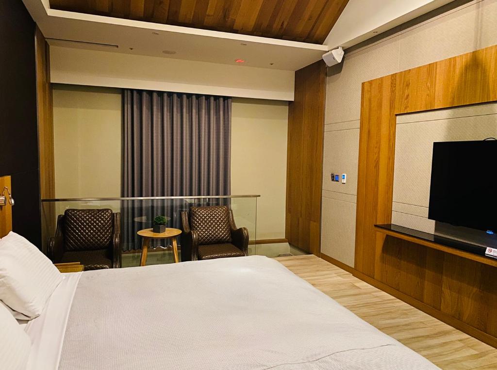 TV a/nebo společenská místnost v ubytování LE LE Motel