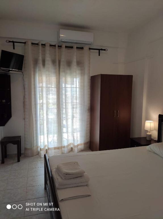 Postel nebo postele na pokoji v ubytování Sivota Rooms Athanasiou