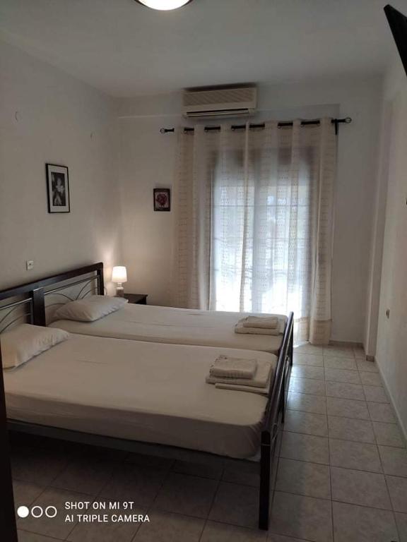 Postel nebo postele na pokoji v ubytování Sivota Rooms Athanasiou