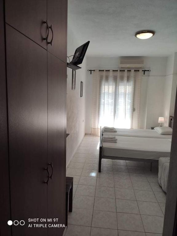 Postel nebo postele na pokoji v ubytování Sivota Rooms Athanasiou