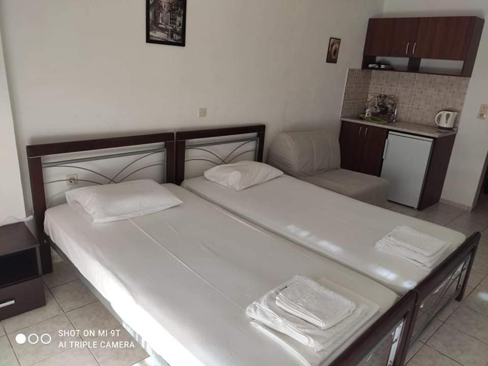 Postel nebo postele na pokoji v ubytování Sivota Rooms Athanasiou