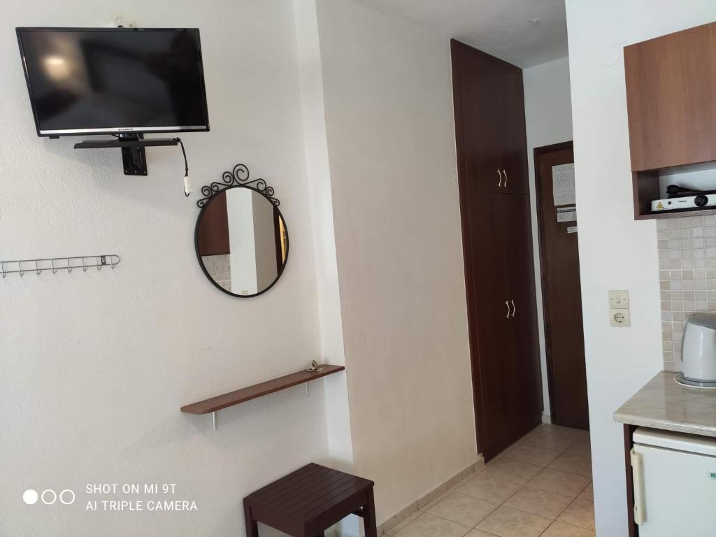 Kuchyň nebo kuchyňský kout v ubytování Sivota Rooms Athanasiou