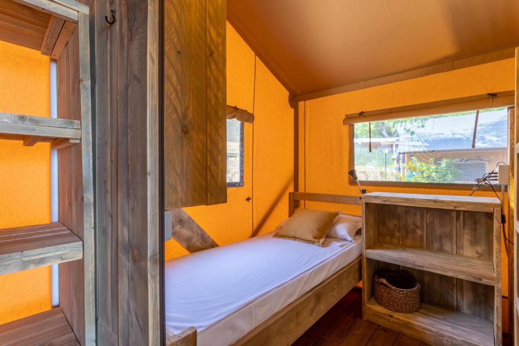 Postel nebo postele na pokoji v ubytování Camping Village Riva Blu