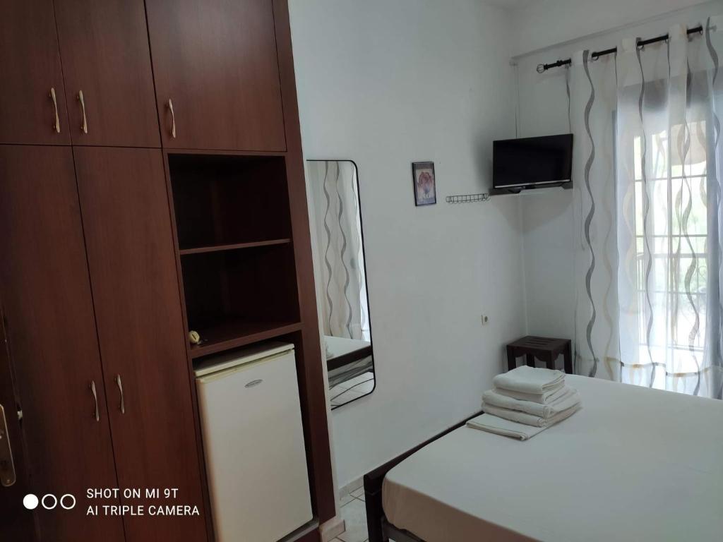 Kuchyň nebo kuchyňský kout v ubytování Sivota Rooms Athanasiou
