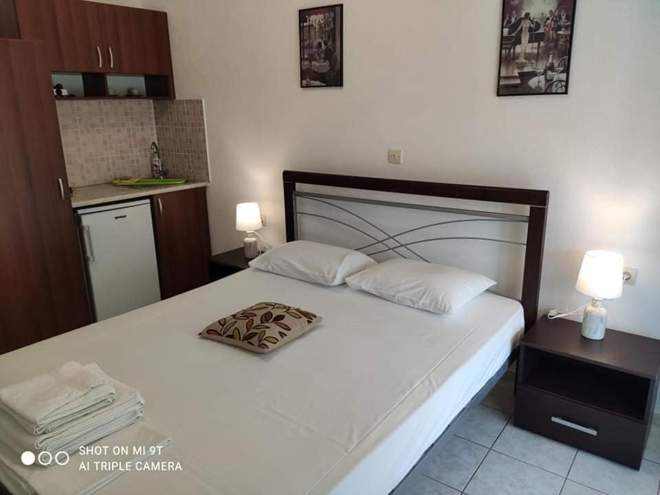 Postel nebo postele na pokoji v ubytování Sivota Rooms Athanasiou