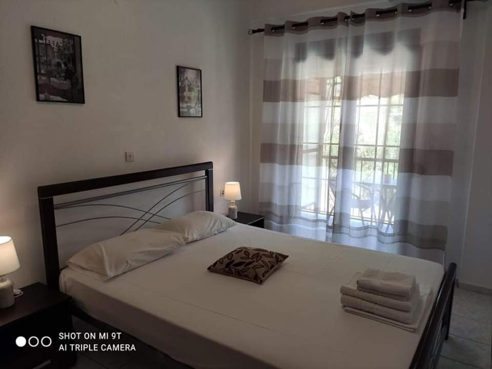 Postel nebo postele na pokoji v ubytování Sivota Rooms Athanasiou