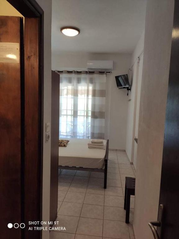 Postel nebo postele na pokoji v ubytování Sivota Rooms Athanasiou