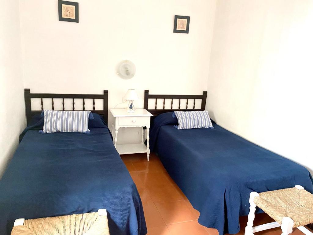Postel nebo postele na pokoji v ubytování Llafranc