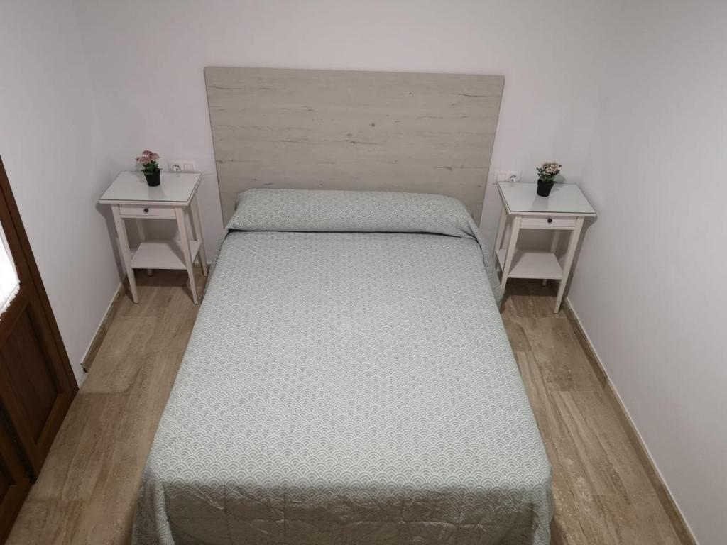 Postel nebo postele na pokoji v ubytování Apartamento La Plazuela