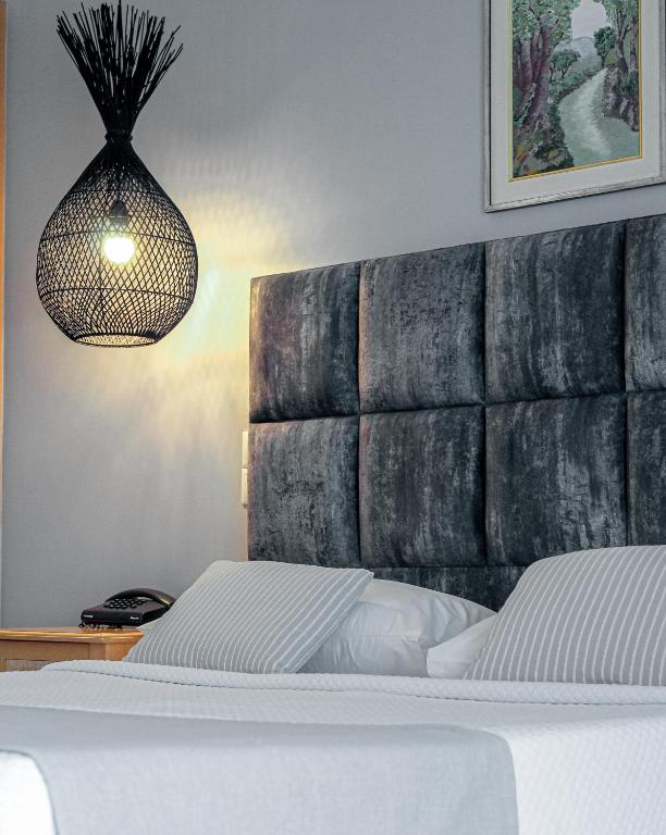 Postel nebo postele na pokoji v ubytování ASTRA Village Resort